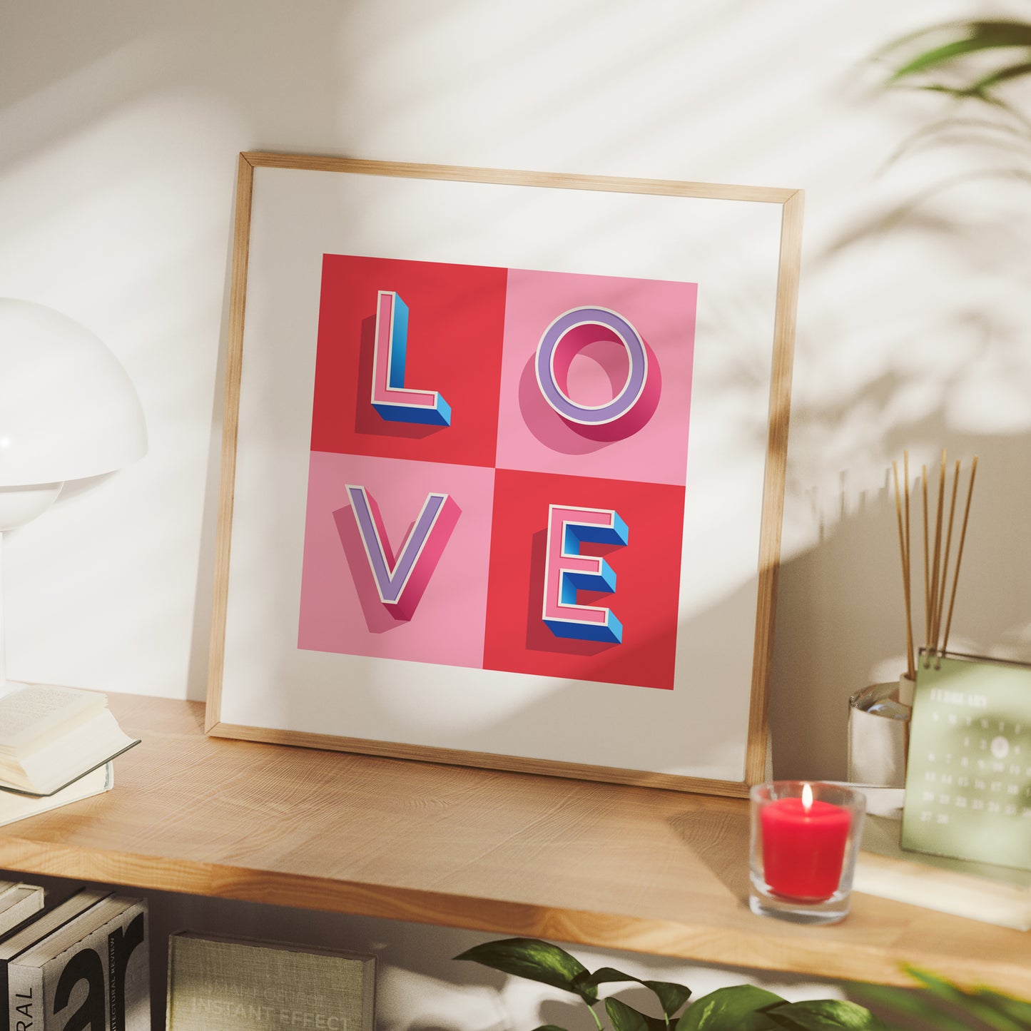 A typographic LOVE Print in Pink and Red check made with love by Alf and Bet displayed on a hallway cabinet