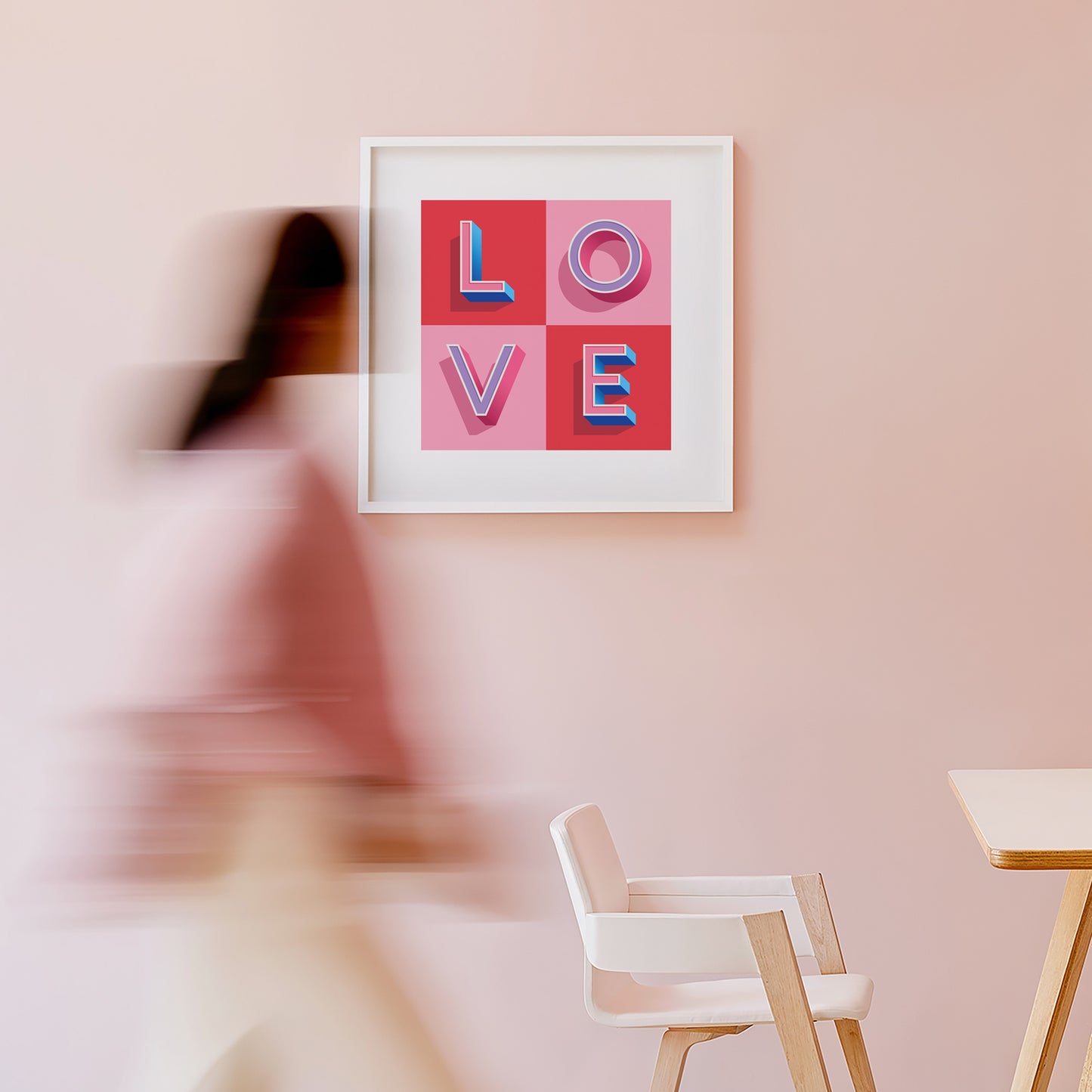 A typographic LOVE Print in Pink and Red check made with love by Alf and Bet displayed on a wall