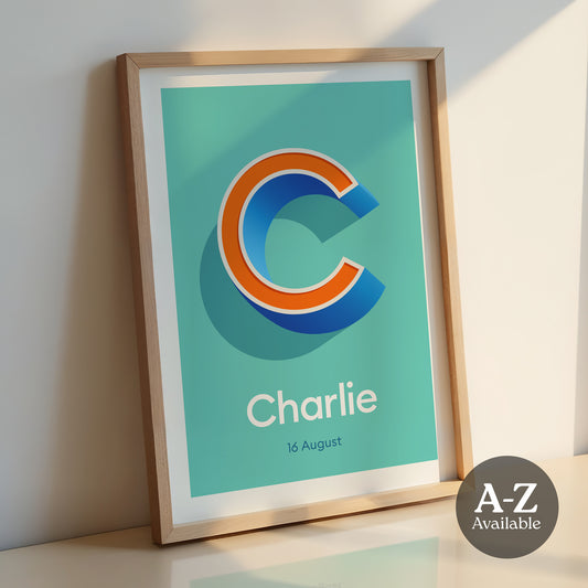 A personalised name and date print from Alf and Bet with a Aqua Blue base colour and 3D letter with Orange infill and contrasting Deep Blue shadow.
