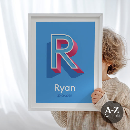 A personalised name and date print from Alf and Bet with a Azure Blue base colour and 3D letter with Sky Blue infill and Deep Pink shadow.