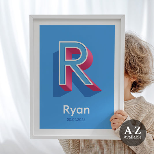 A personalised name and date print from Alf and Bet with a Azure Blue base colour and 3D letter with Sky Blue infill and Deep Pink shadow.