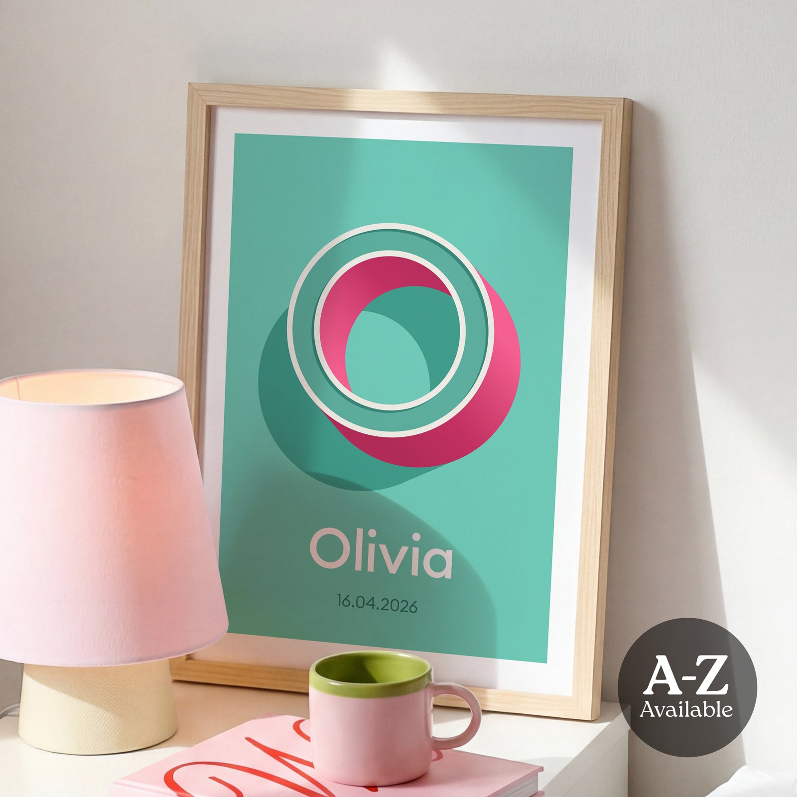 A personalised name and date print from Alf and Bet with a Mint Green base colour and 3D letter with Mint Green infill and contrasting Deep Pink shadow.