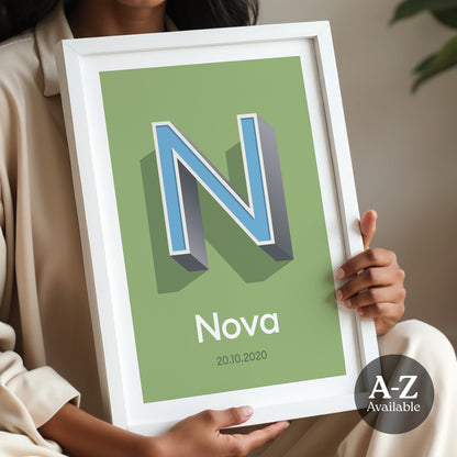 A personalised name and date print from Alf and Bet in Olive Green colour with Sky Blue letter