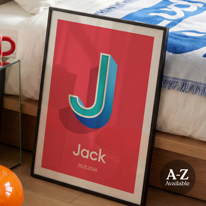 A personalised name and date print from Alf and Bet with a Red base colour and 3D letter with Turquoise infill and contrasting Deep Blue shadow.