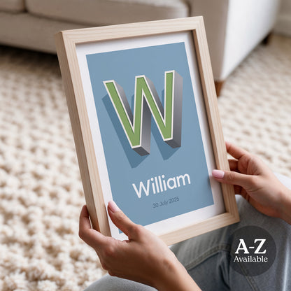 A personalised name and date print from Alf and Bet with a Sky Blue base colour and 3D letter with Light Green infill