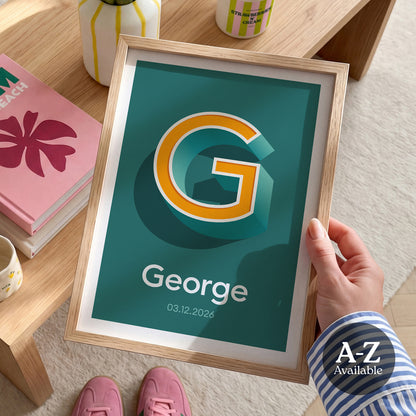 A personalised name and date print from Alf and Bet with a Dark Teal Green base colour and 3D letter with Yellow infill
